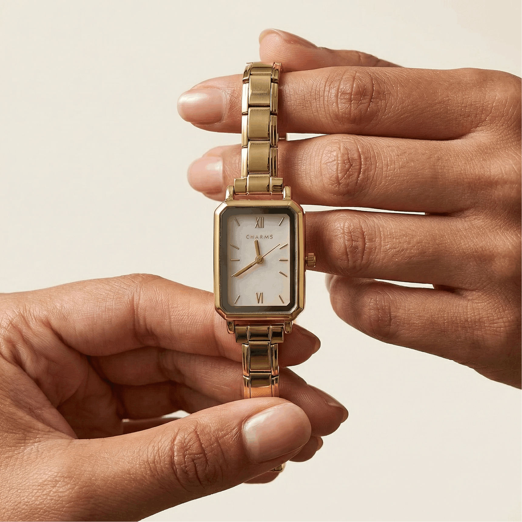 Como – Guldmodell med vit urtavla