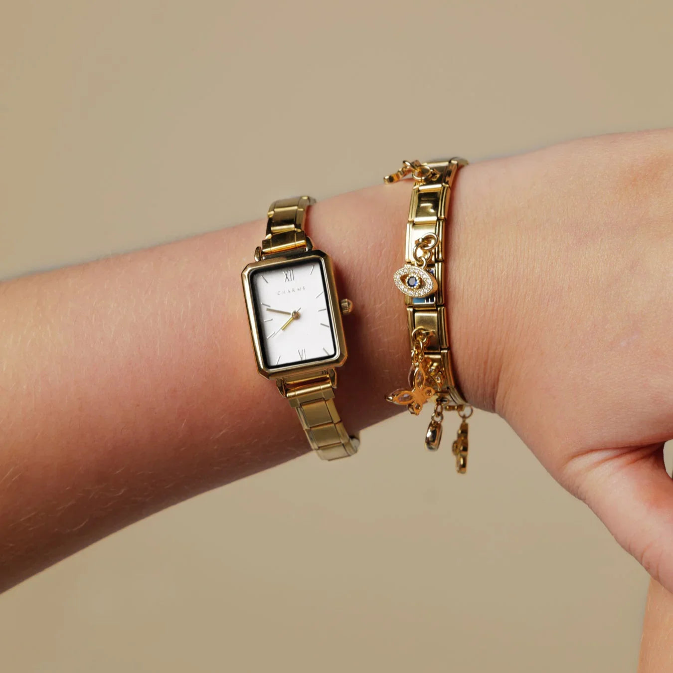 Como – Guldmodell med vit urtavla